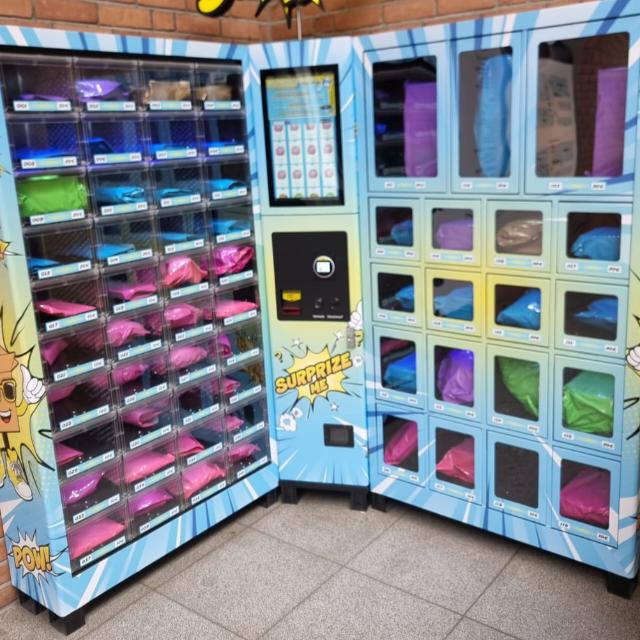 Aktueller FDK-Select-Eckautomat mit neutral verpackten Waren